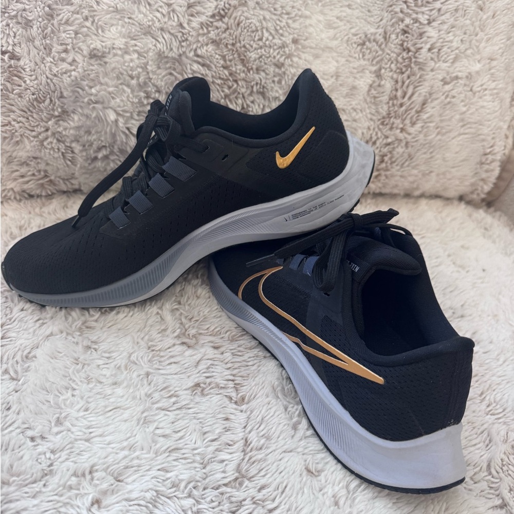 Nike Pegasus 38 black and gold running shoe